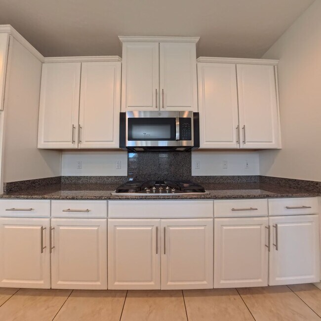 Building Photo - Exceptional Dual Master Residence with Modern Upgrades