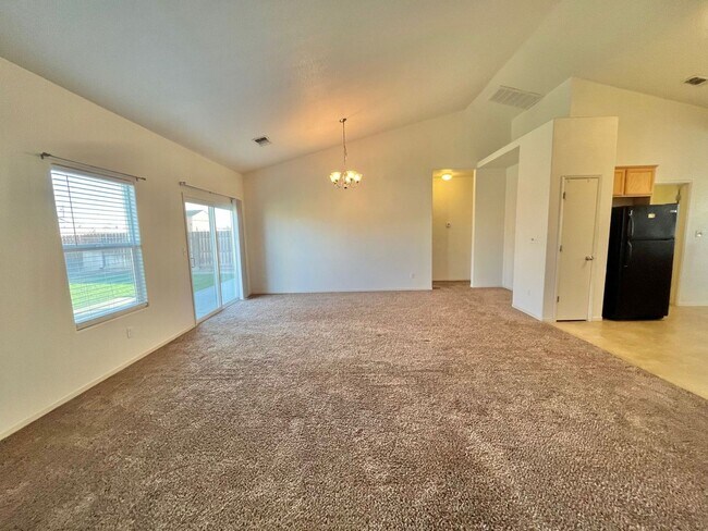 Building Photo - Large Corner Lot Home with Landscaping included!