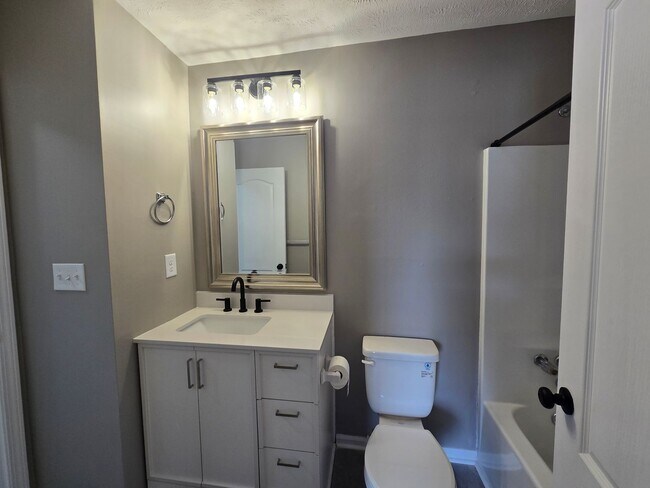 Building Photo - Welcome to Your Stylish New Townhome!