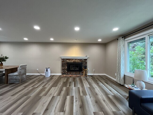 Building Photo - Three-Bedroom Home Near Nike Campus with Bonus Room, Large Deck & Two-Car Garage