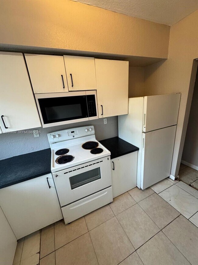 Building Photo - 8407 NW 5th Ave