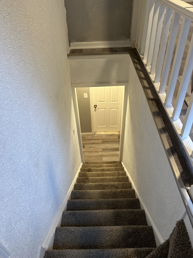 Stairs to upper level - 18918 Westphalia St