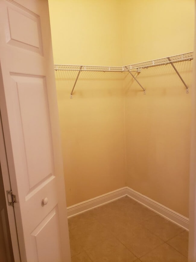 Building Photo - 3 bedroom town home for rent early January 2026, gated community with a garage for $1725 per month