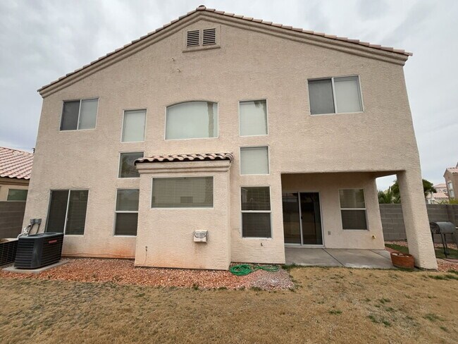 Building Photo - This beautiful two-story home is located in a gated community.