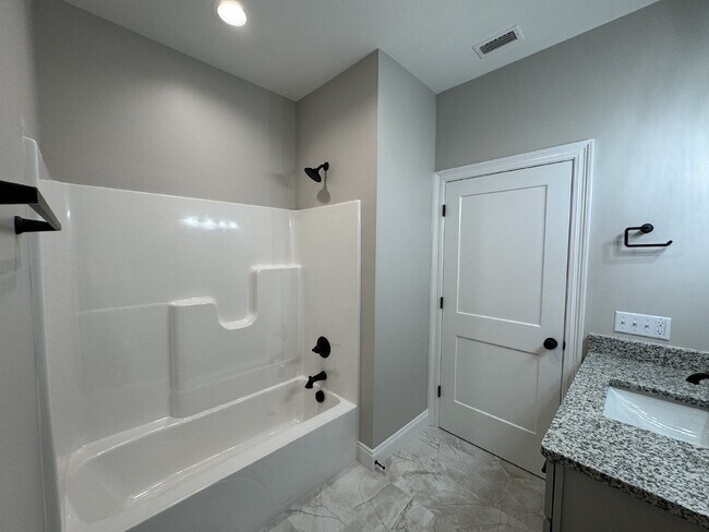 Building Photo - "Charming 4 Bed, 2 Bath Home with Granite ...