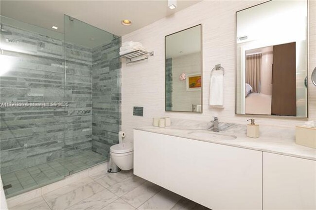 Building Photo - 10201 Collins Ave