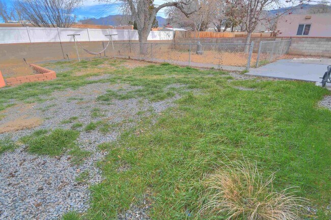 Building Photo - NE Heights 3 Bedroom Home Available----- NOW