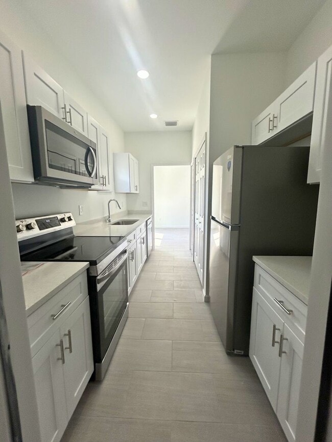 Building Photo - NEW CONSTRUCTION! Modern 3BR/2BA Home with Garage-Peaceful Lake Placid Location
