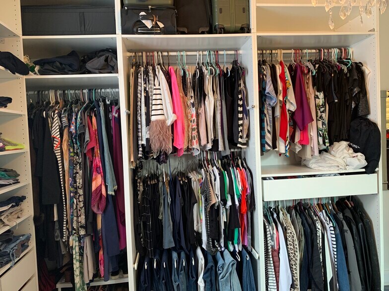 Just one side of the huge primary closet/dressing area. - 1316 Pleasant St