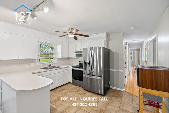 Building Photo - Spacious 4-Bedroom Home with Dual Kitchens...