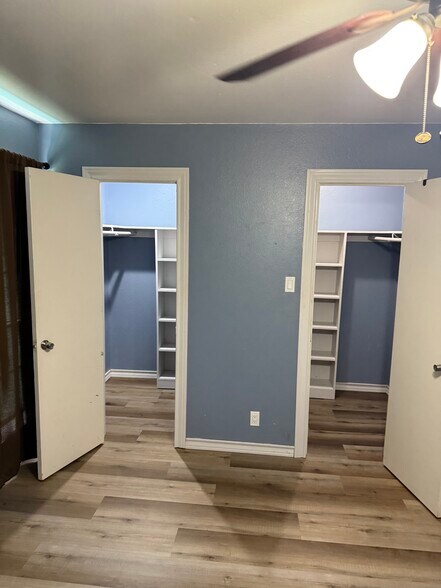 master bedroom his and hers closets - 2304 Shidler Dr