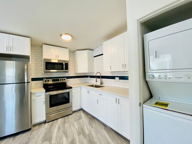 Primary Photo - Modern living in this completely remodeled...