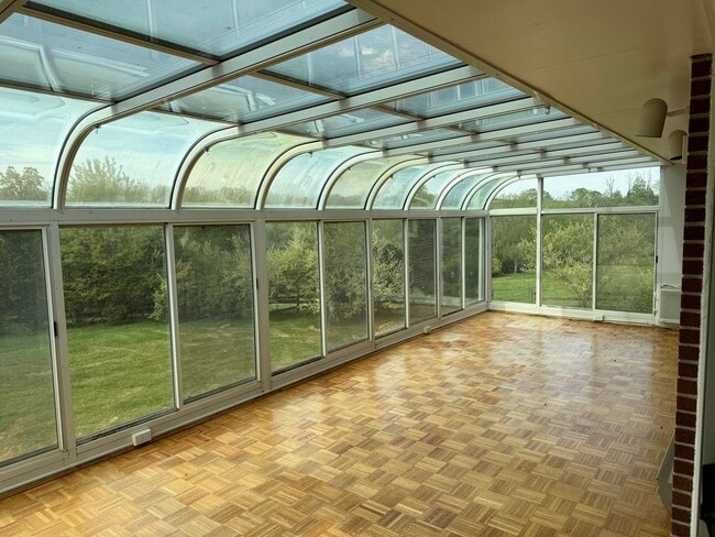 Building Photo - Exquisite Brick Ranch with Modern Upgrades, Countryside Charm And Two Car Garage