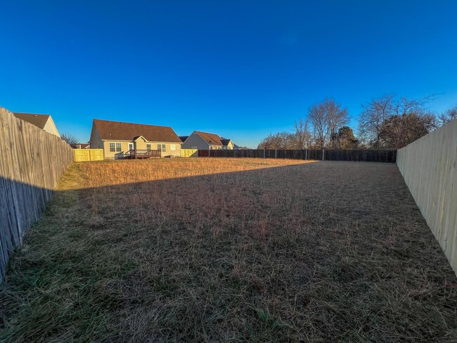 Building Photo - Single Family with a Massive Fenced-In Bac...