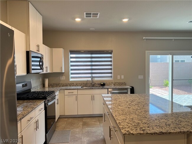Building Photo - 7521 Dragonfruit Ave