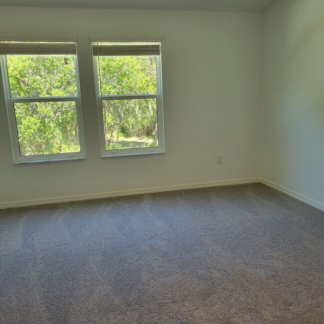 Building Photo - Annual UNfurnished almost BRAND NEW townho...