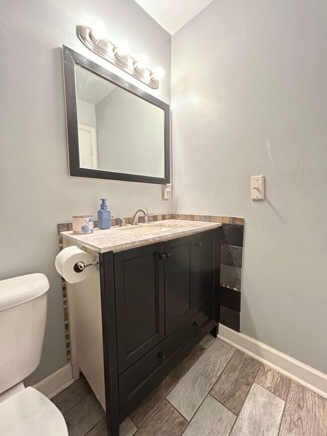 Building Photo - Introducing this fantastic townhome in the...