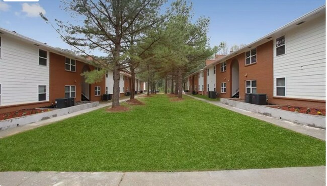 Building Photo - Beautiful Apartments under New Management at Hidden Pines