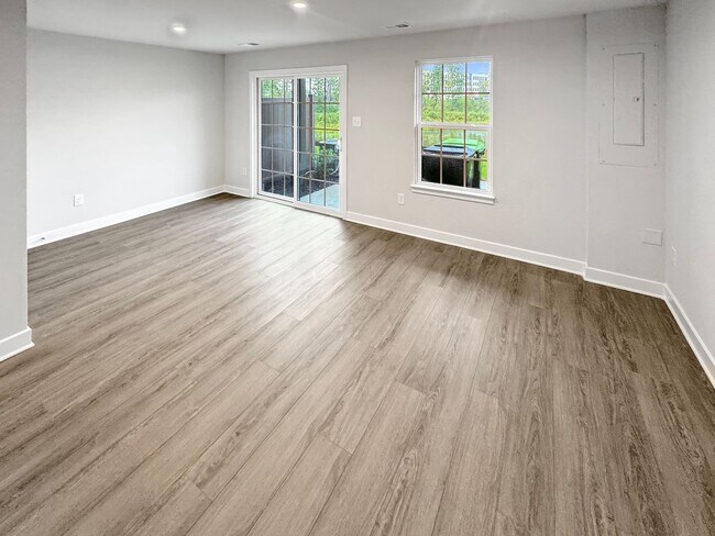 Building Photo - Spacious 3-Bedroom Townhome with Finished ...