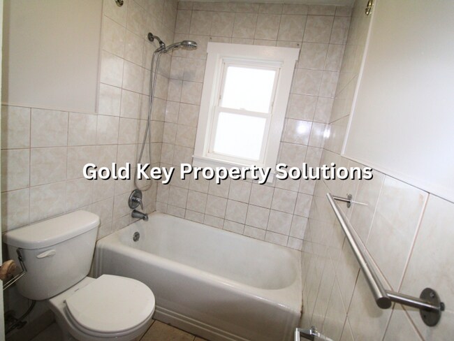 Building Photo - Large 2 BR 1 BA House with Family Room, Basement, Garage, and Separate Storage Building (SECTION ...