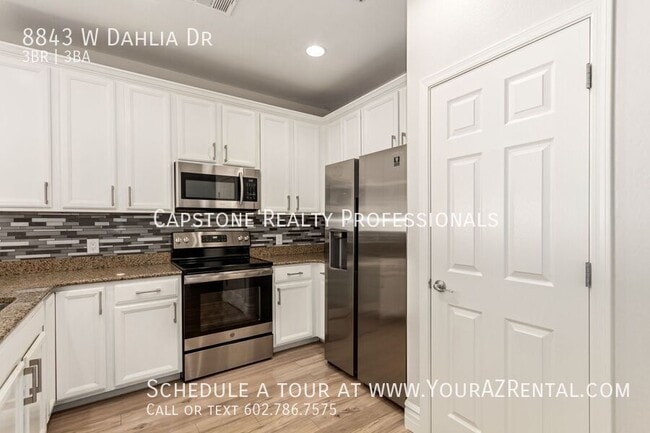 Building Photo - 8843 W Dahlia Dr