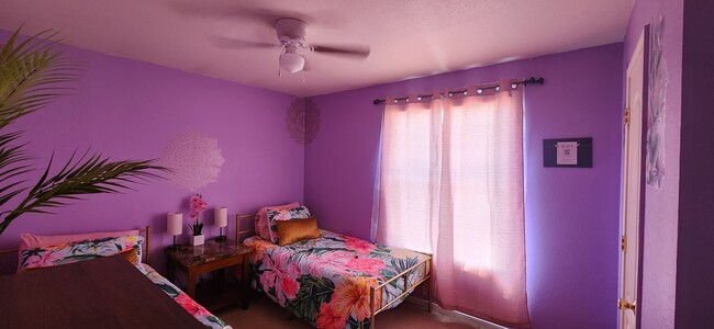 Purple room during daylight - 2313 Terrace Dr