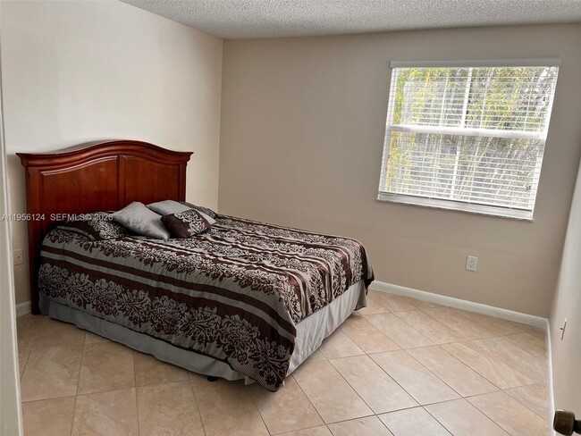 Building Photo - 4878 NW 97th Pl