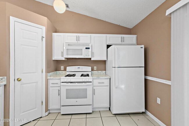 Building Photo - 7323 Lawn Tennis Ln