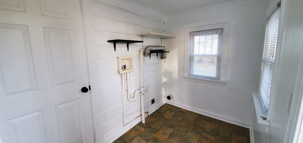 Laundry room with rear entrance - 2401 Spring Garden St