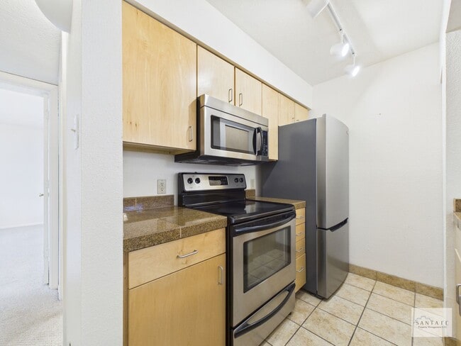 Building Photo - Two Bedroom Second Level Condo Available Now!