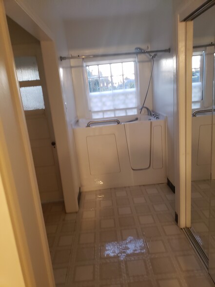 walking tub with shower - 325 S Francisca Ave