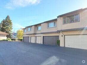 Building Photo - Upstairs Condo with 2 Car Garage, Fresh Pa...