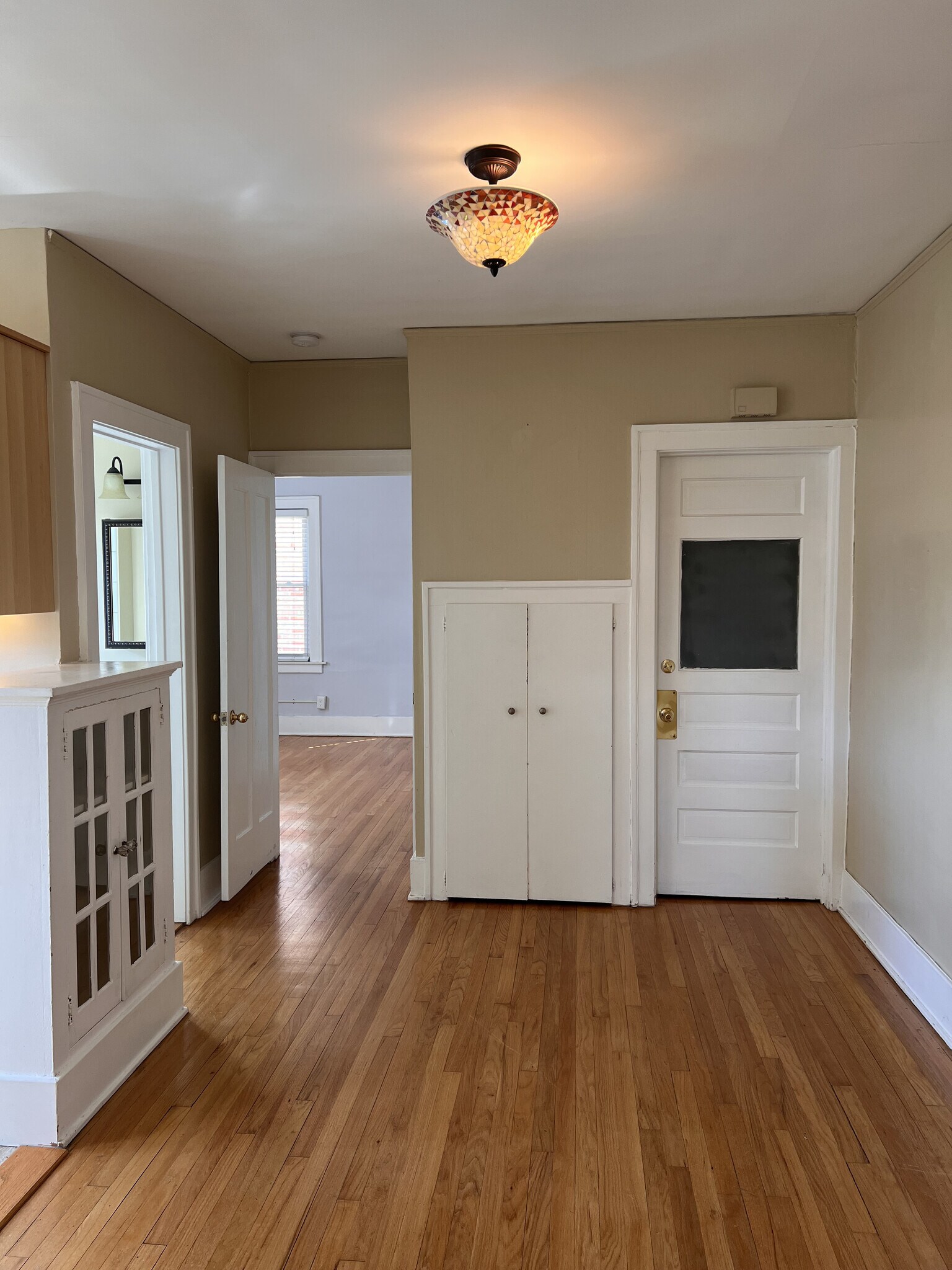 Dining room and view of back door. - 210 S Laurel St
