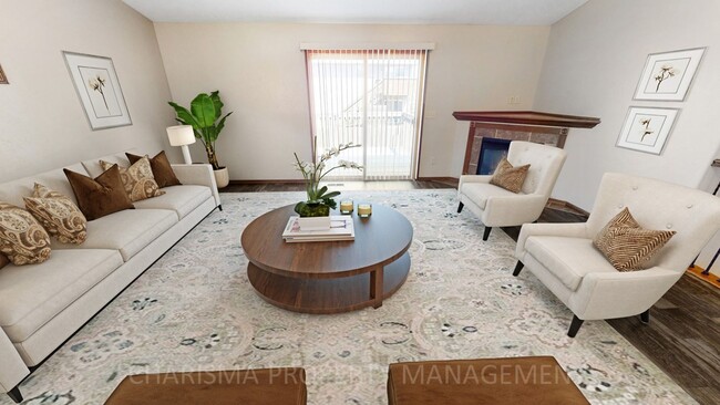 Building Photo - BEAUTIFUL 3 BD, 2 BA TOWNHOME WITH A FULLY EQUIPED KITCHEN, VAULTED CEILINGS, FIREPLACE, ATTACHED...