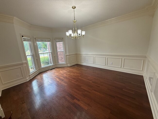 Building Photo - Spacious 5-Bedroom Home on a Corner Lot in...