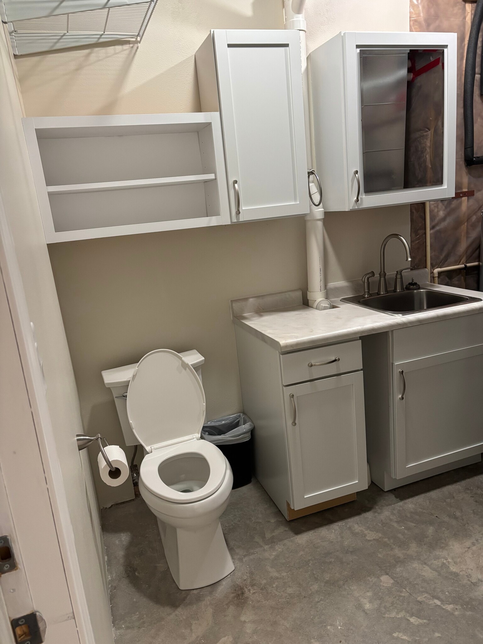 Garage half bathroom - 2225 Middleton Beach Rd
