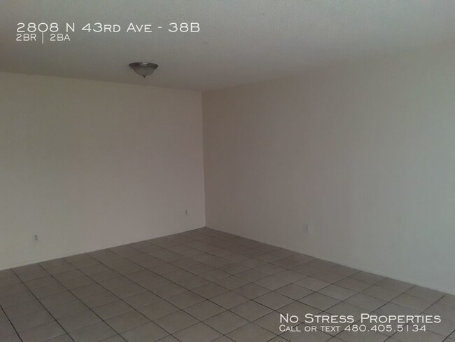 Building Photo - 2 Bed Condo at 43rd Ave and Thomas!