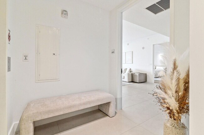 Building Photo - 10203 Collins Ave