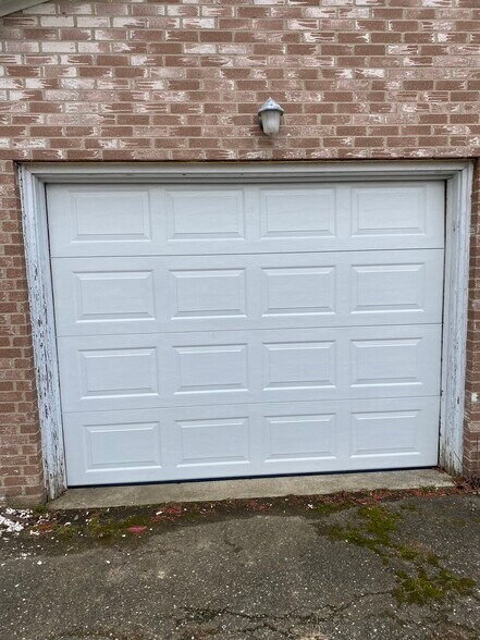 Brand new garage door - 6656 Palmer Dr NW