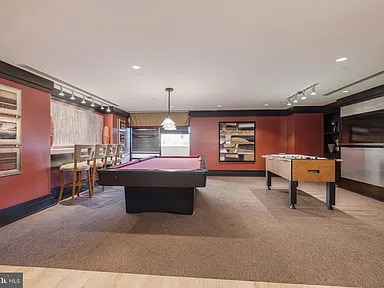 The game room. - 4500 S Four Mile Run Dr