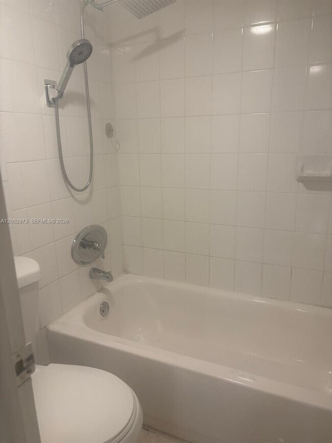 Building Photo - 6950 W 6th Ave