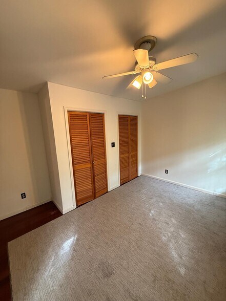 Double closets in the master provide ample hanging - 327 Hudson Ave