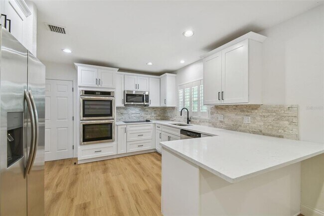 Building Photo - 4802 W Longfellow Ave