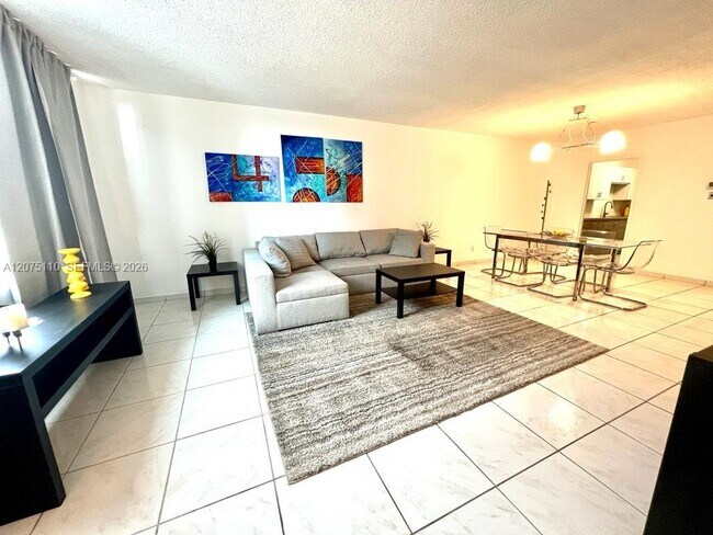 Building Photo - 5401 Collins Ave