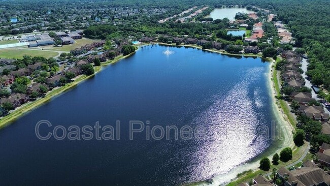 Building Photo - 9068 Lake Chase Island Way