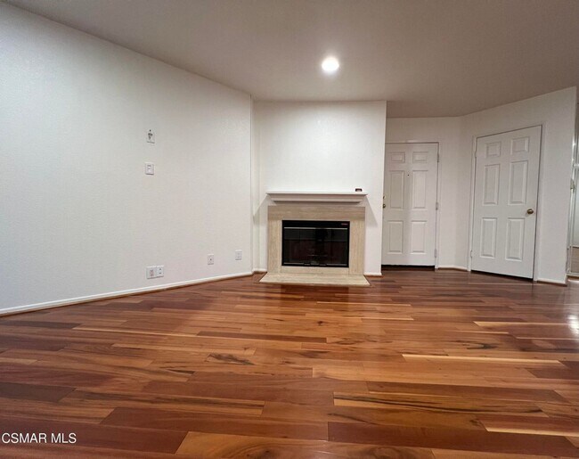 Building Photo - Welcome to this beautifully situated first-floor end unit