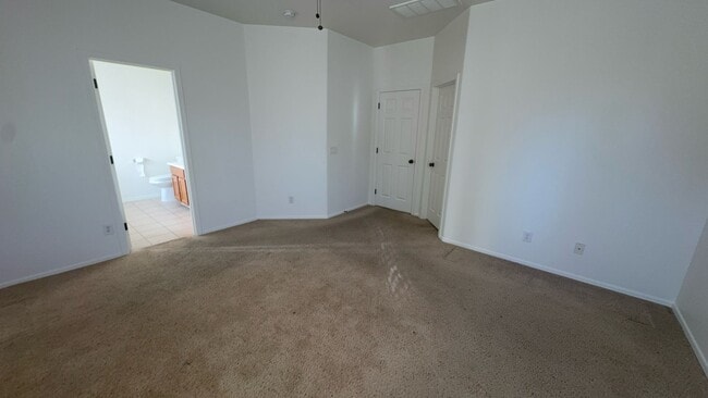 Building Photo - Stylish 3BR Oasis: Open Layout, Gourmet Kitchen, Master Retreat, and Serene Patio! Your Dream Hom...