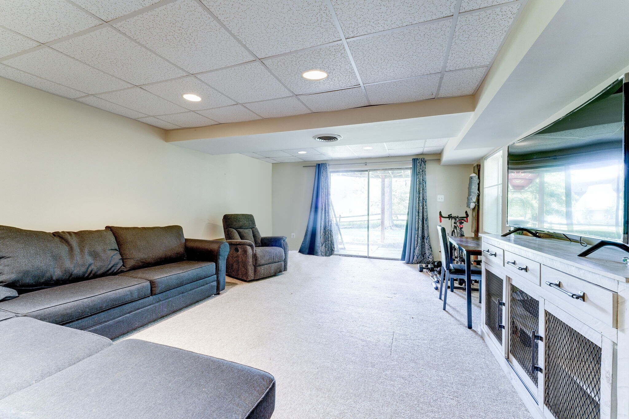 Bonus room in Lower Level with exit to rear yard! - 10108 Donegal Ct