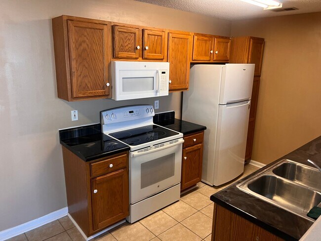 Building Photo - 3806 Maypop Cir