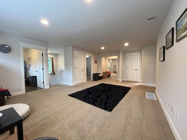 Building Photo - Spacious Corner-Lot Home with Three Levels...